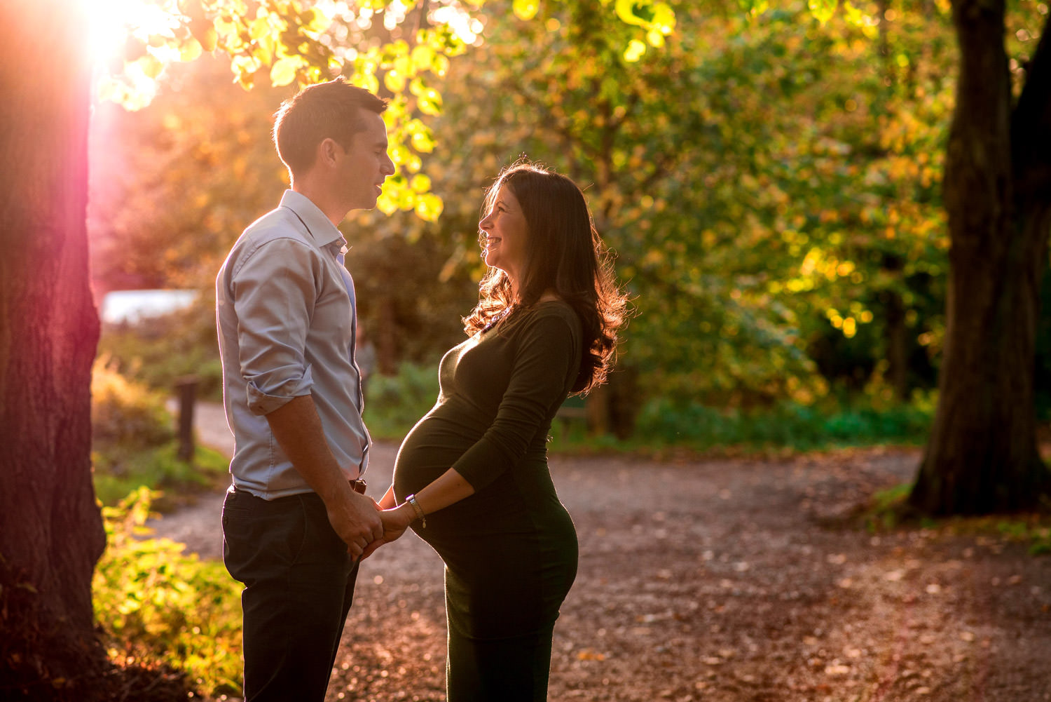 future parent on outdoor maternity photo shoot